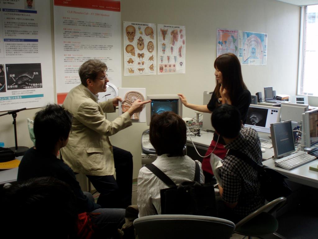 Miyuki demonstrating the ultrasound machine at Open Campus
